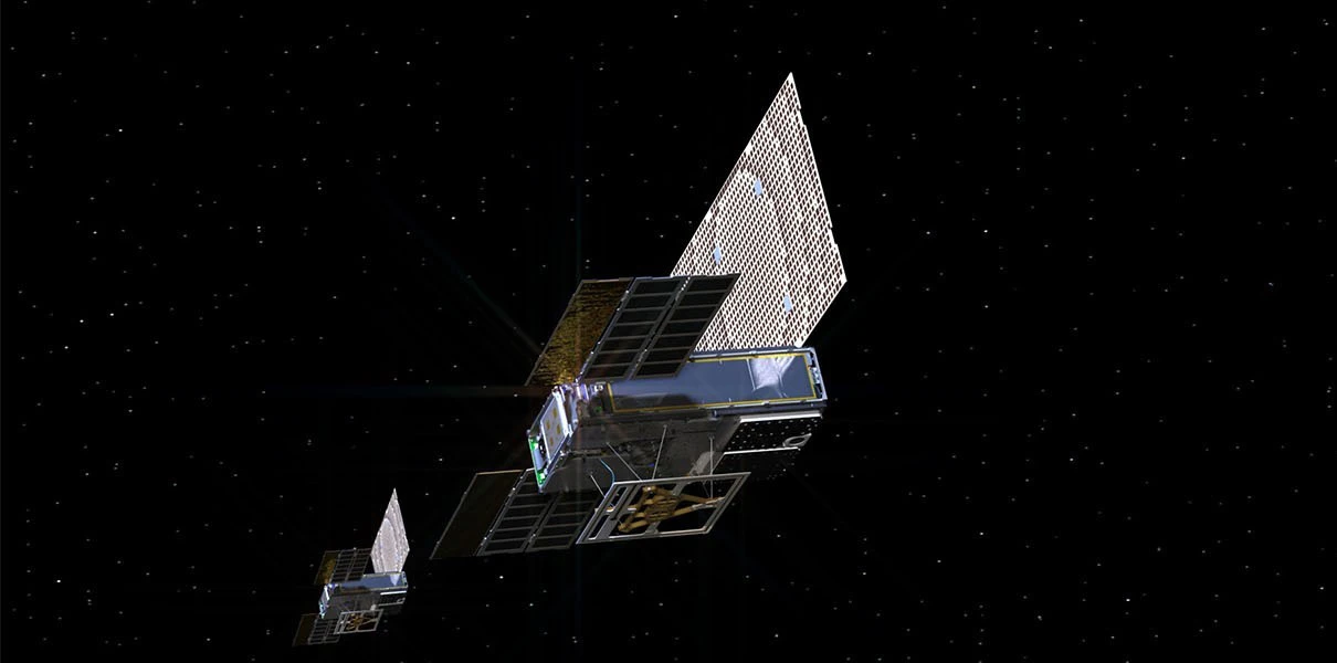 MarCO CubeSats with solar arrays and antennas deployed in space
